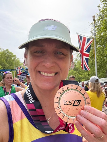 assistant town clerk Adrianne Mullins with her London Marathon medal